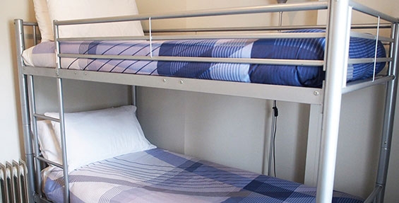 a set of single bunks in another room