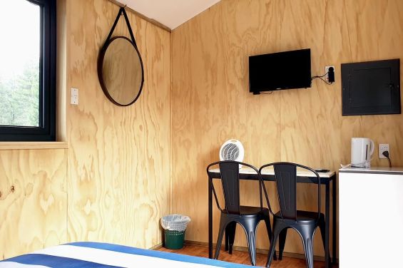 Tourist Cabins - TV and table